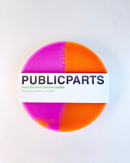 PUBLICPARTS heat-sensitive silicone coaster with branded paper sleeve packaging.