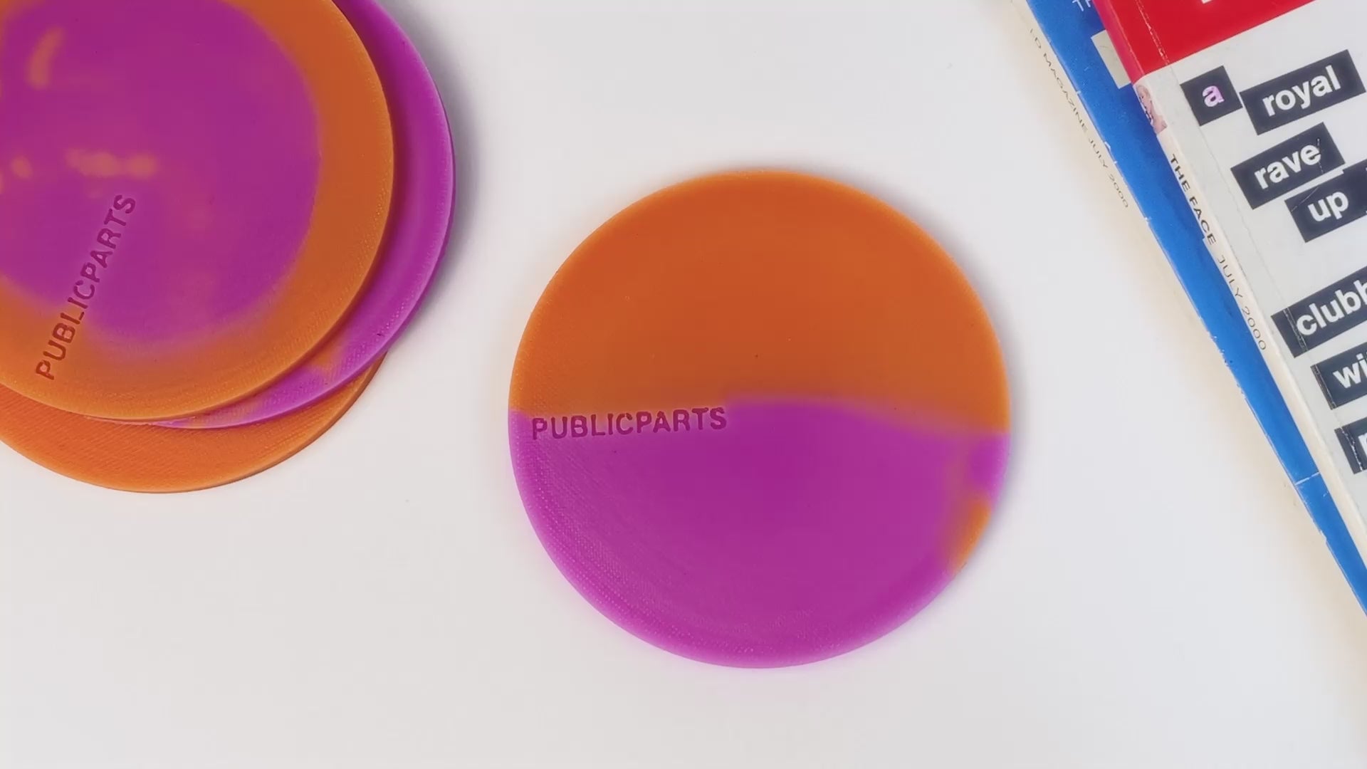 Video showing heat-reactive silicone coasters changing colour when a hot cup is placed on them.